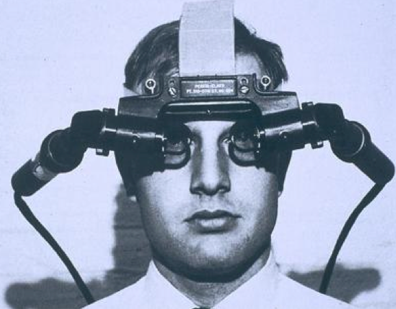 The Sword of Damocles head-mounted display. "The ultimate display would, of course, be a room within which the computer can control the existence of matter," Sutherland wrote in his 1965 essay. (Credit: Ivan Sutherland "The Ultimate Display")